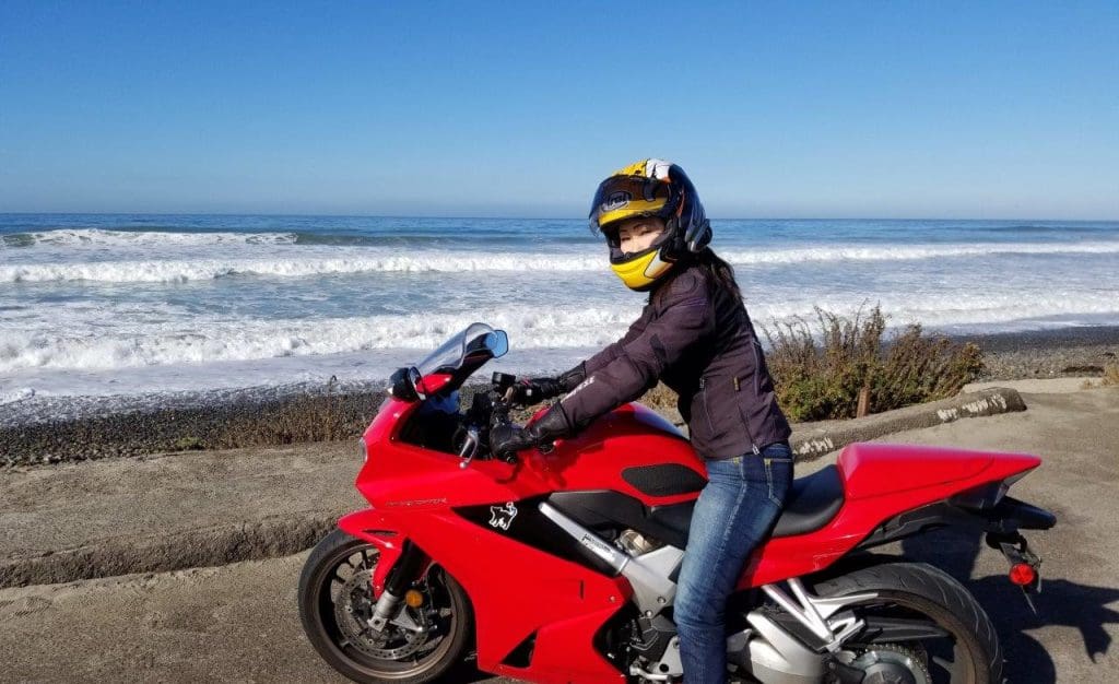 Me riding my Honda VFR800 by the Pacific Ocean.