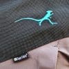 The Mosko Moto brand logo is a Basilisk lizard silhouette.