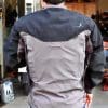 Rear view of Basilisk jacket with armour layers underneath