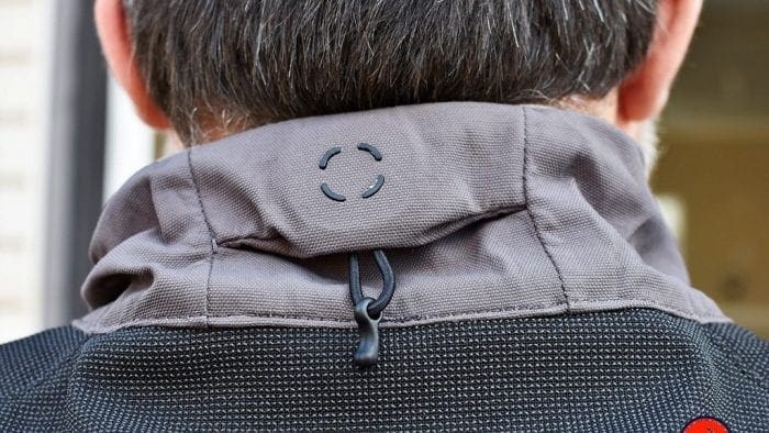 The collar adjuster device on the Mosko Moto Basilisk jacket.