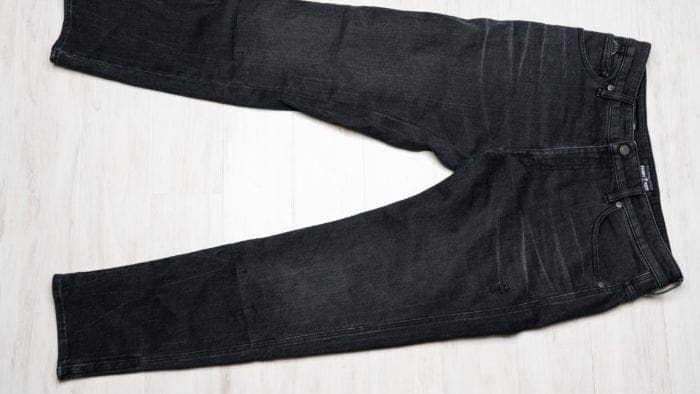 Pre-distressed black denim look Pre-distressed black denim look