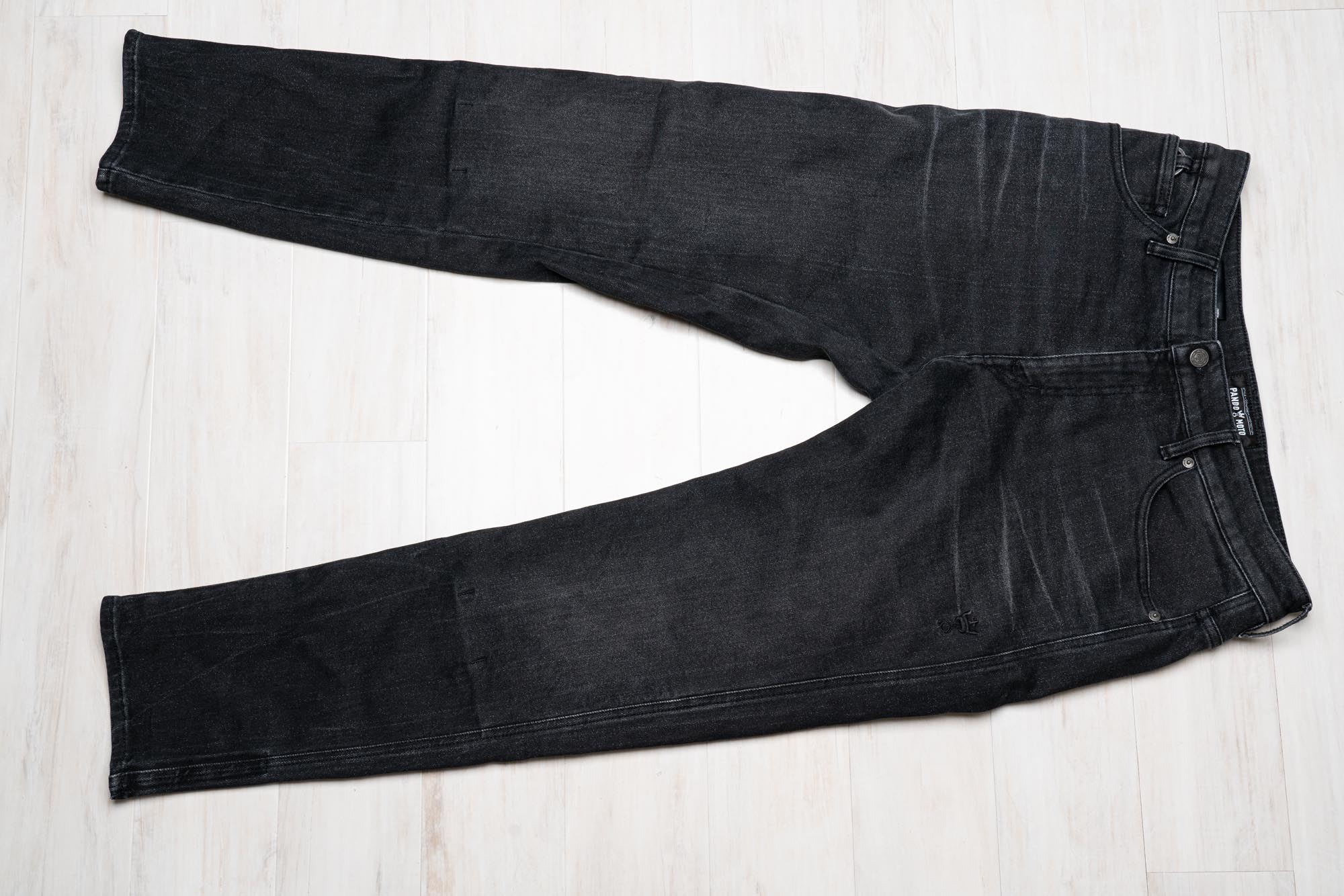 Pre-distressed black denim look