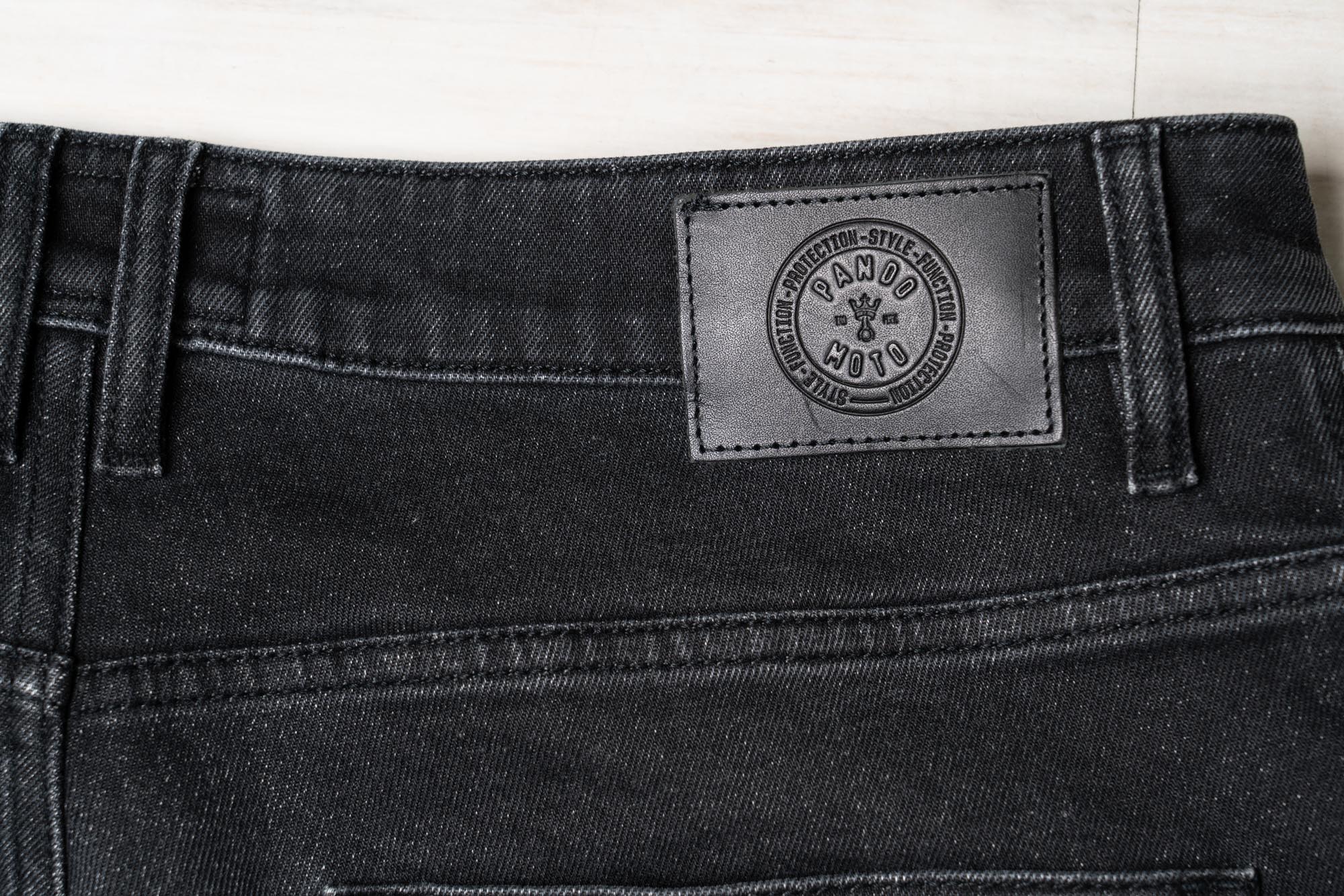 Pando Moto leather emblem on rear pocket