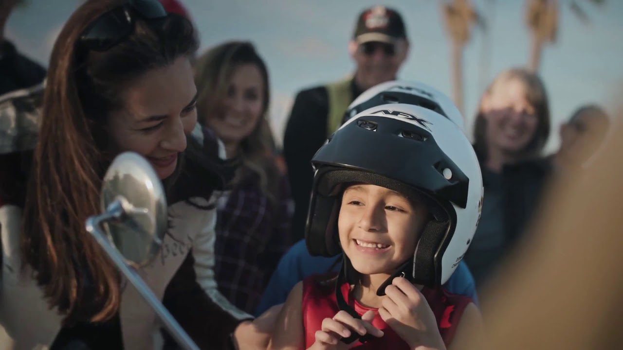 Kid smiling at a Ride for Kids Event