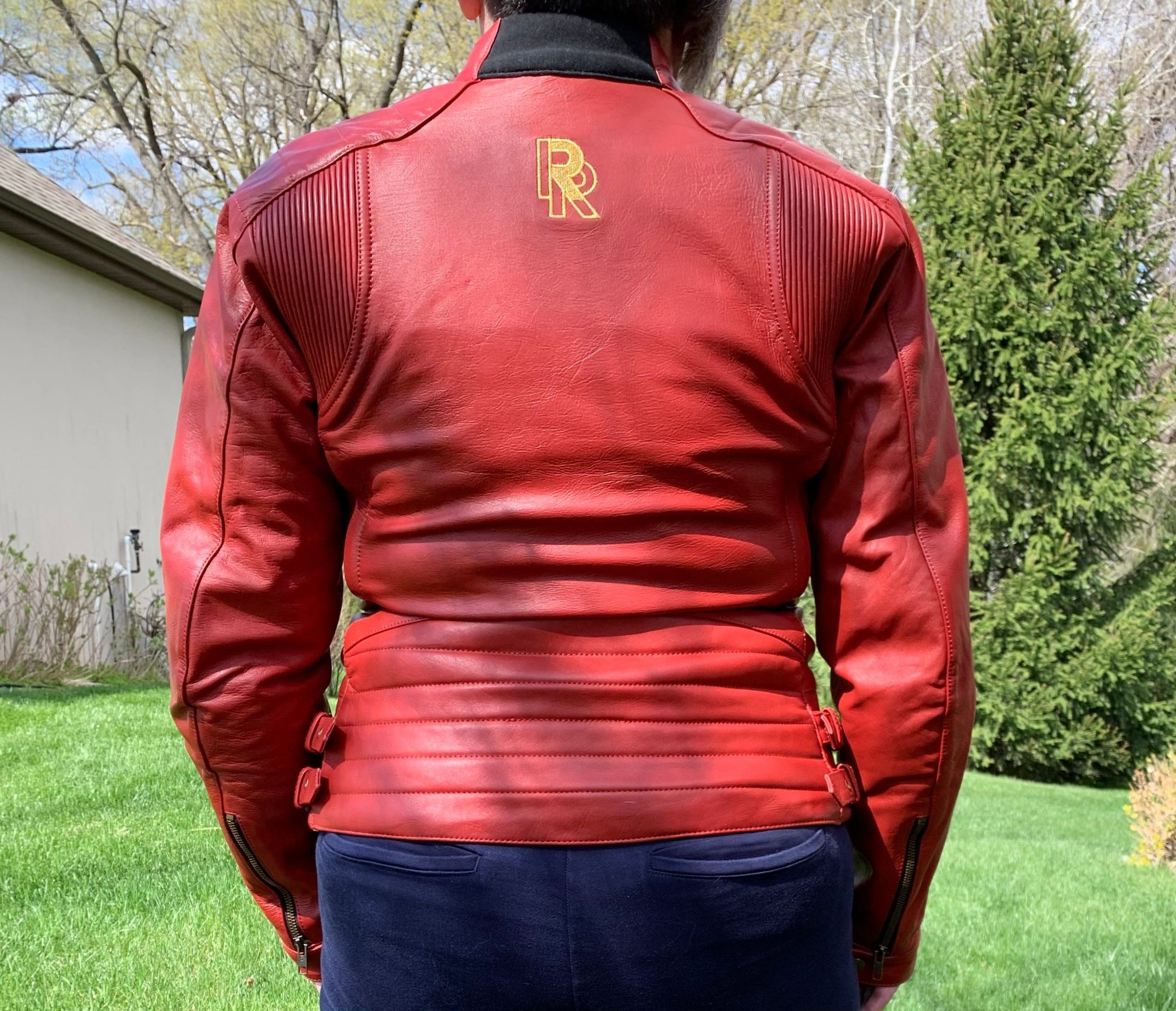 Rear view of rider wearing Phoenix jacket