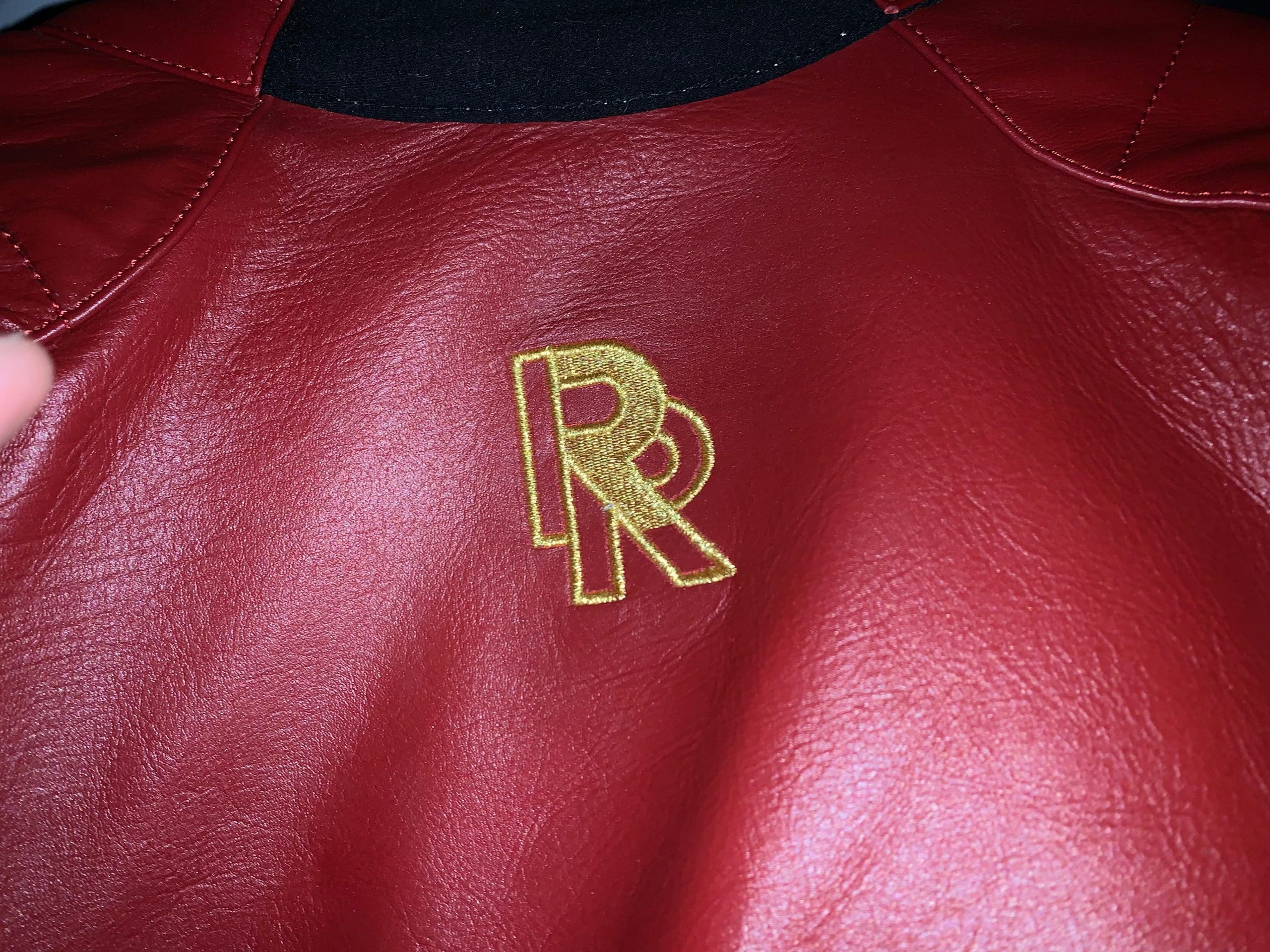 Raven Rova logo on the back of jacket