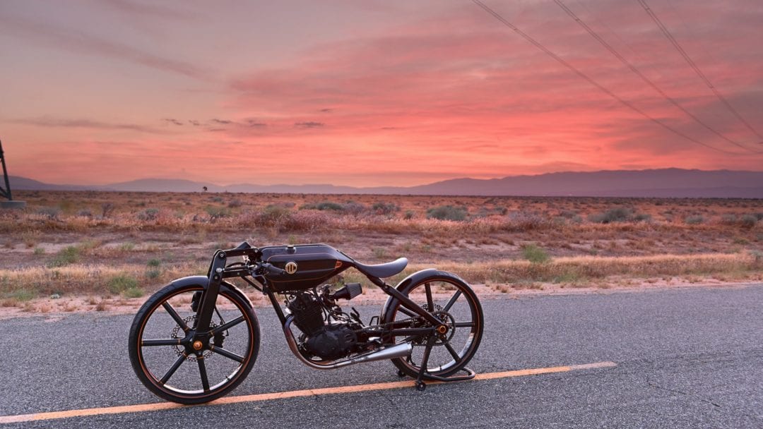 a side profile of A Bike Company's ABC 500, in front of a sunset