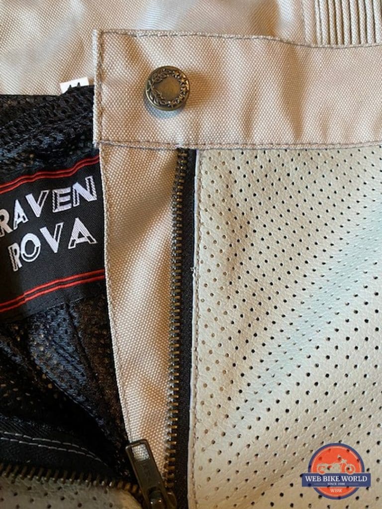 Closeup of front zipper and button