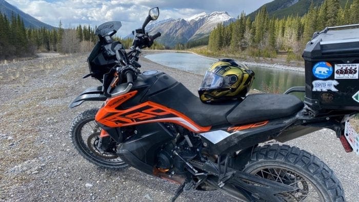 The Shark Spartan GT helmet sitting on the seat of a KTM 790 Adventure in the Canadian Rockies near Canmore, Alberta. The Shark Spartan GT helmet sitting on the seat of a KTM 790 Adventure in the Canadian Rockies near Canmore, Alberta.