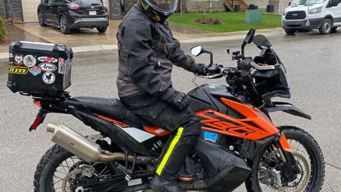 Jim riding a KTM 790 Adventure wearing a Shark Spartan GT Replikan helmet.