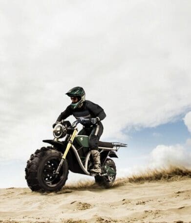 A rider trying out The Grunt, an electric off-roading motorcycle made by Volcon Powersports