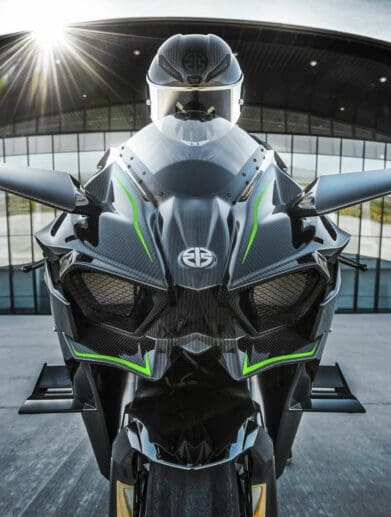A Kawasaki H2 with a helmet sitting on top