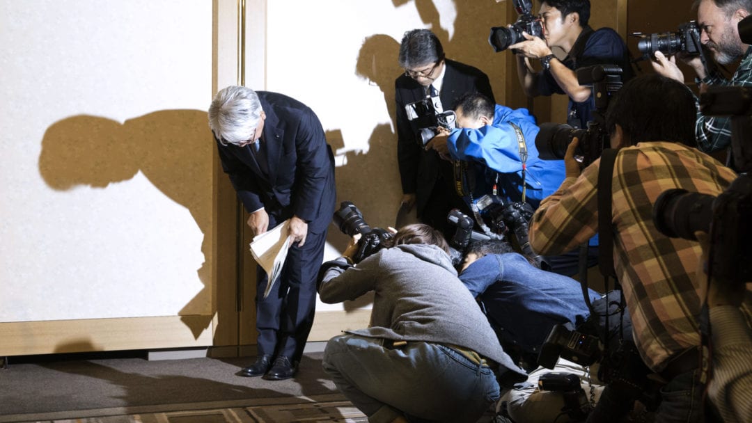 Hiroya Kawasaki, president and chief executive officer of Kobe Steel Ltd., bows as he leaves a news conference in Tokyo, Japan, Friday, 