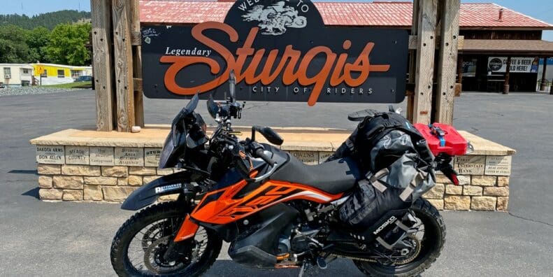 My KTM 790 Adventure in front of the welcome sign in Sturgis, SD.