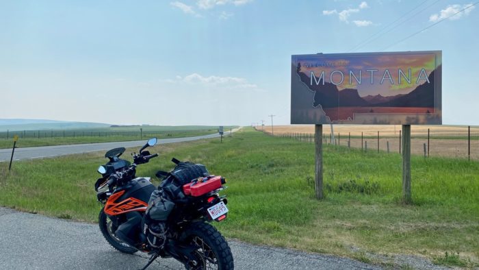 My KTM 790 Adventure at the welcome sign to Montana.