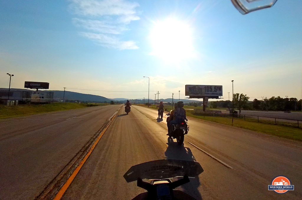 Riding motorcycles near Sturgis, SD at sunset.