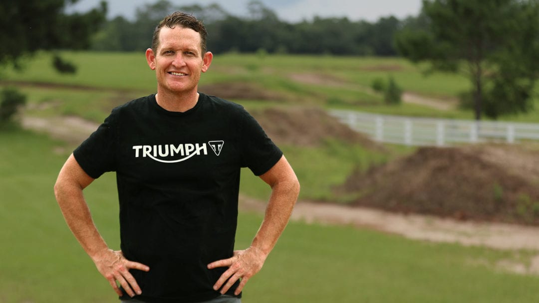 a view of Ricky Carmichael, posing for the Carmichael/Triumph partnership