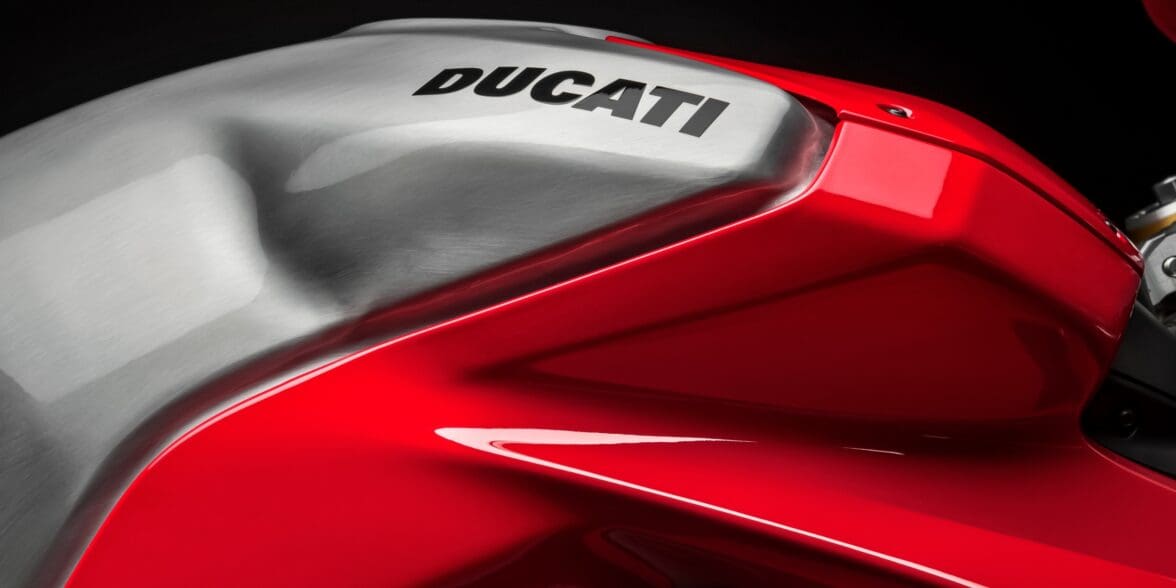 A picture of a gas tank of a Ducati bike.