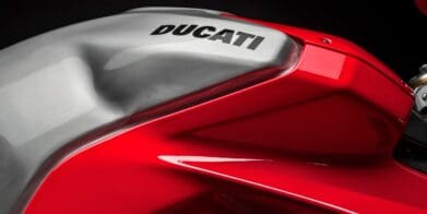 A picture of a gas tank of a Ducati bike.