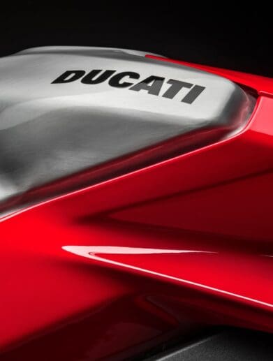 A picture of a gas tank of a Ducati bike.