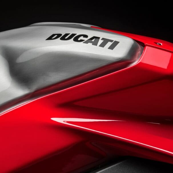 A picture of a gas tank of a Ducati bike.