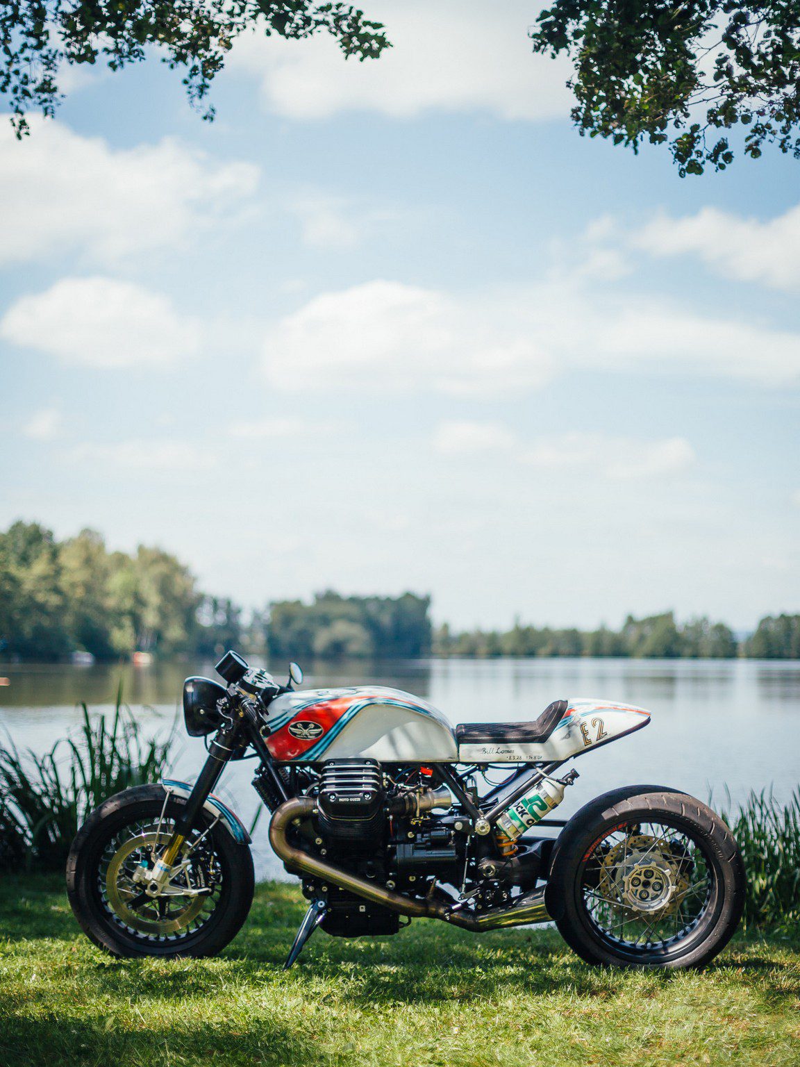 Moto Guzzi Motorcycle by a lake in Europe
