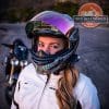 Brittany Morrow wearing a motorcycle helmet and jacket