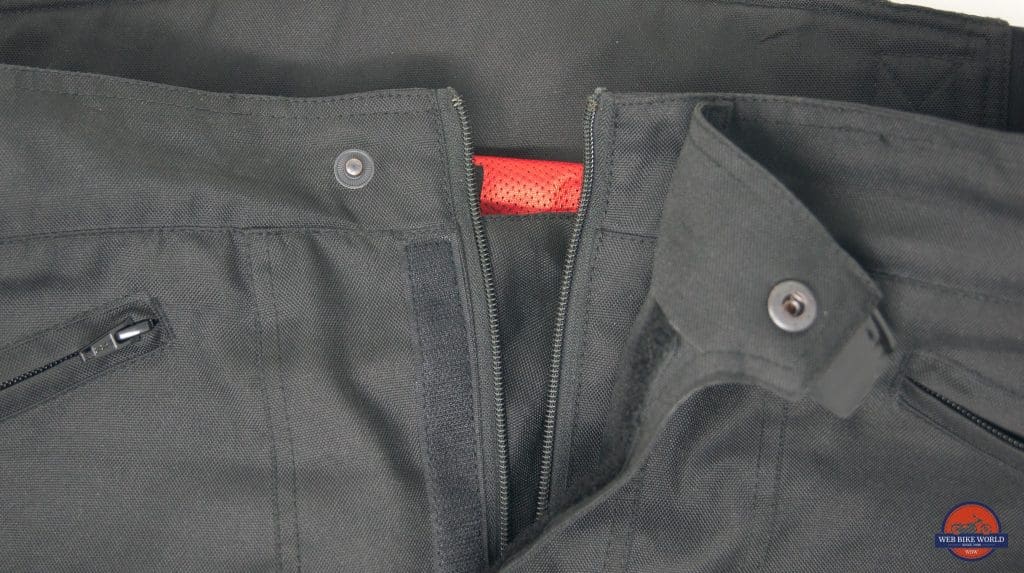 The front zipper, waistband and pockets of the Gryphon Moto Indy Pants.
