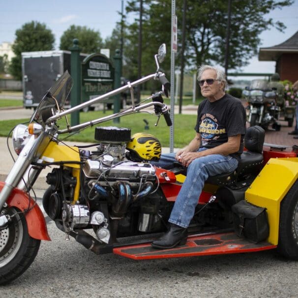 an anttendee of the Rebel Road Bike Rally shows off his sweet ride