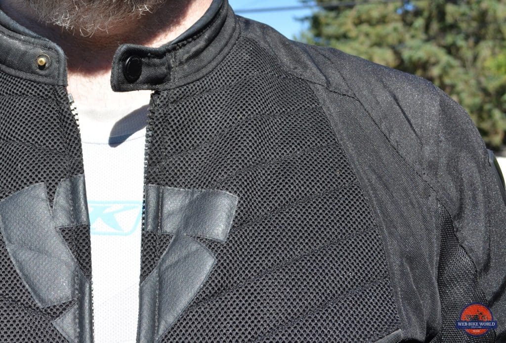 Top collarbone area of the Arc Air Mesh jacket, with focus on neck straps and shoulder material