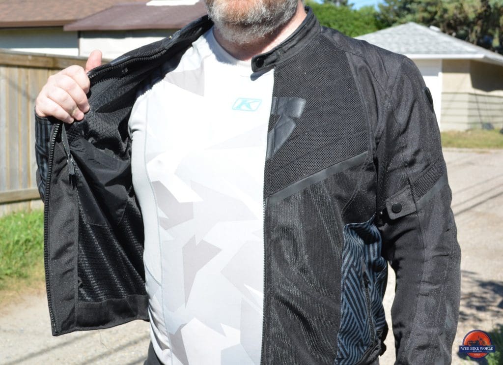 A front view of the Arc Air Mesh jacket, unzipped to show airflow zones