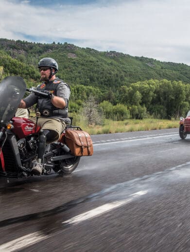 A view of a veteran riding an Indian Motorcycle for the Veterans Charity Ride