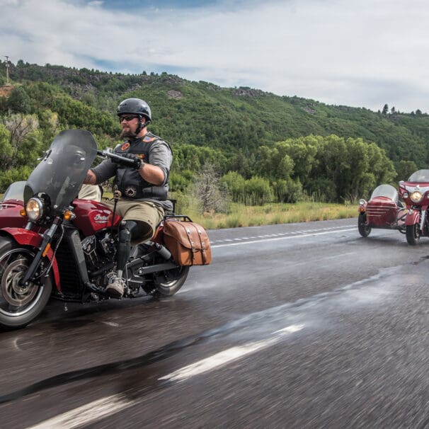 A view of a veteran riding an Indian Motorcycle for the Veterans Charity Ride