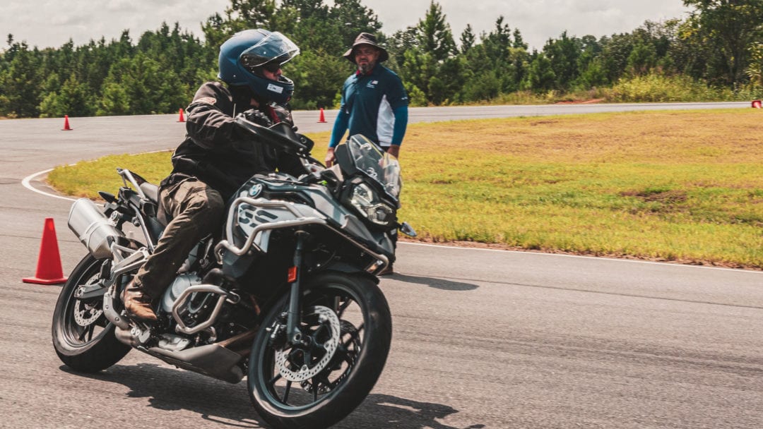 side profile of a BMW motorcycle rider putting their new skills from the BMW Motorcycle Safety Course to good use