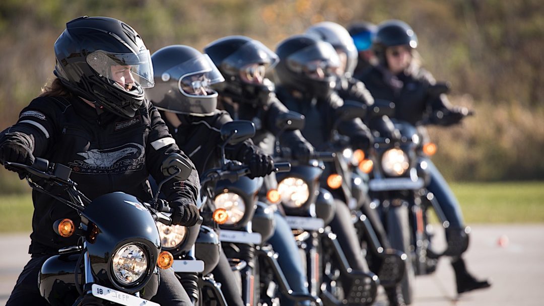 a view of new riders on their bikes for Harley Davidson