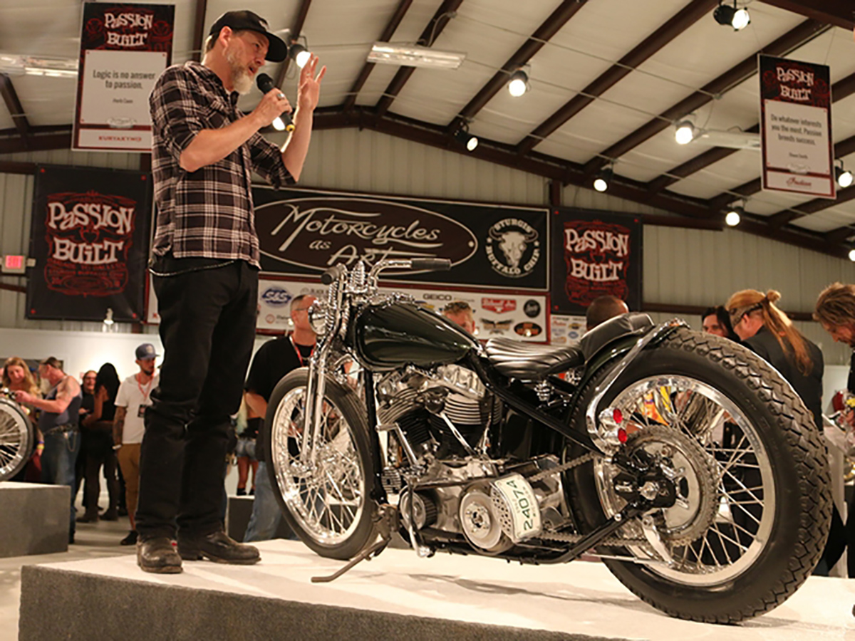 A view of Brad Richards, Harley-Davidson Vice President of Styling and Design, talking about a Harley bike