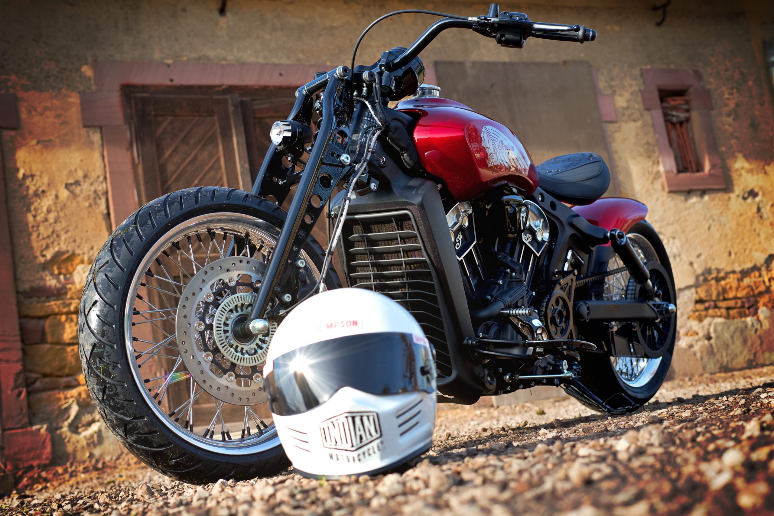 A frontal view of the Red Wings custom Indian Motorcycle, courtesy of French dealer Indian Motorcycle Metz, complete with the CEO of Indian Motorcycle Metz's helmet