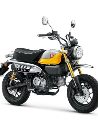 A side view of the 2022 Honda Monkey in Banana Yellow