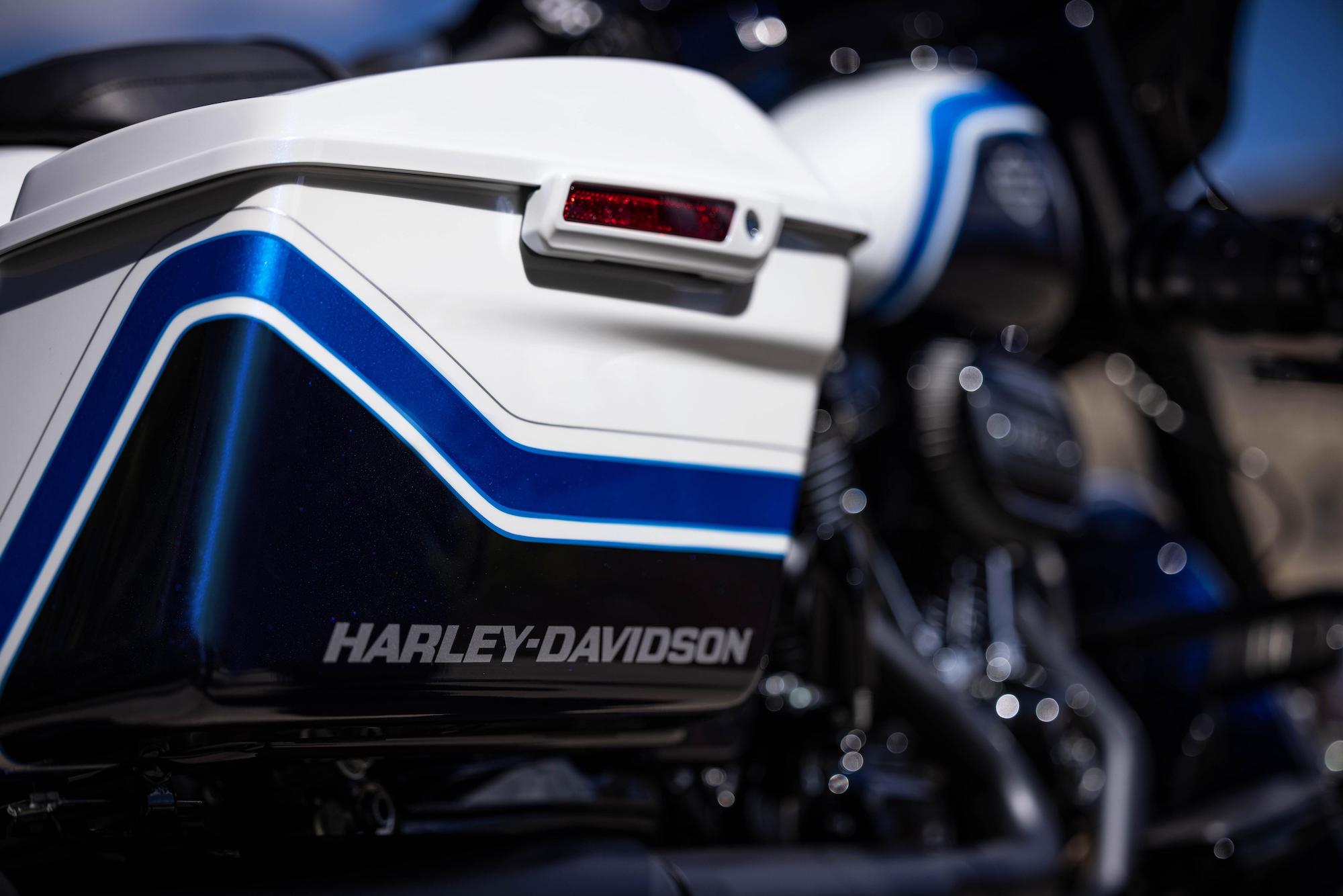 a close-up of the bags on the the all-new 2021 Harley Davidson Street Glider hot-rod bagger in a limited edition Arctic Blast paint job, completed by Gunslinger Custom Paint