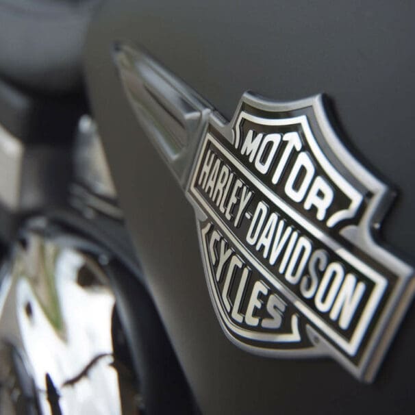 a close-up of a H-D logo on a Harley Motorcycle