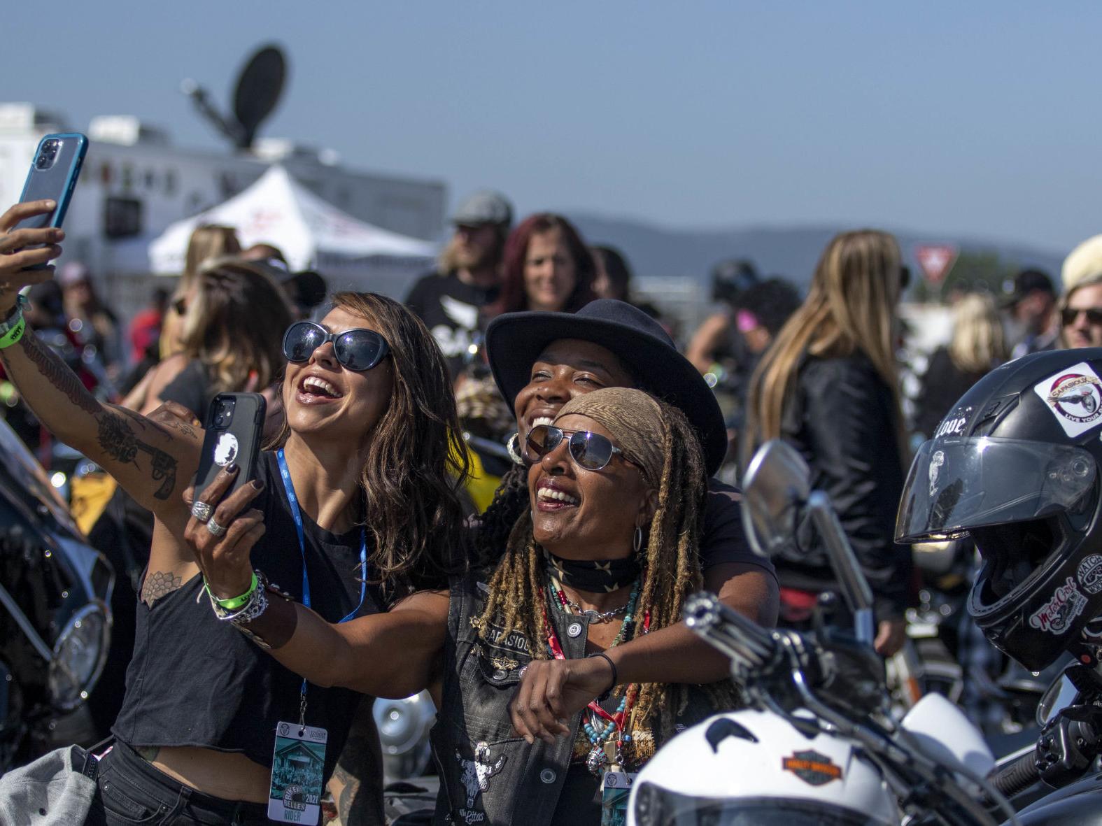 A view of female bikers taking a photo together