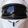 A view of the white Outrush R Modular Helmet, with the sunglasses option flipped down