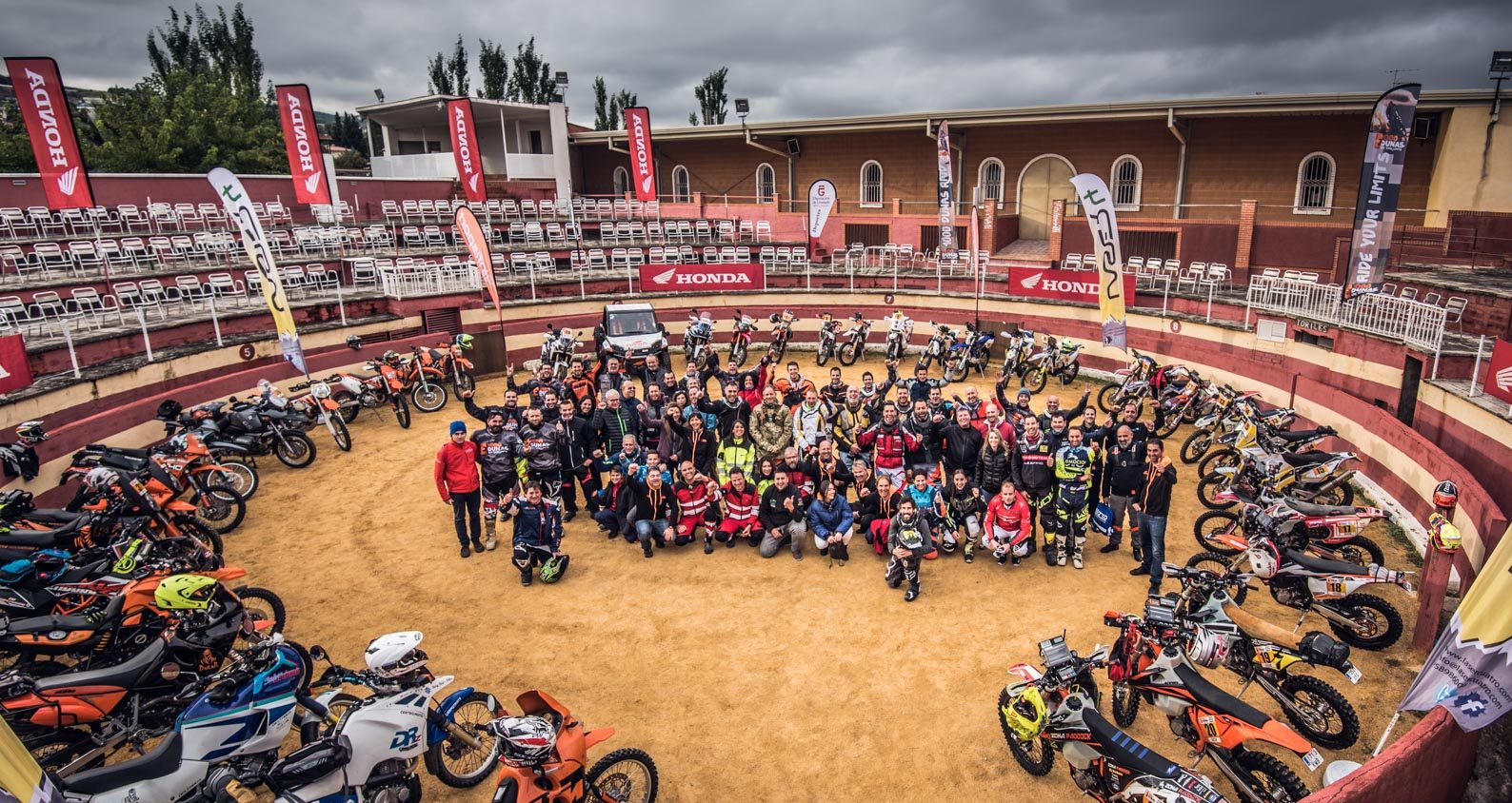 a view of the attending participants of the 2018 1000 Dune motorcycle raid. Here, motorcycles are parked in a circle in anticipation of the trip