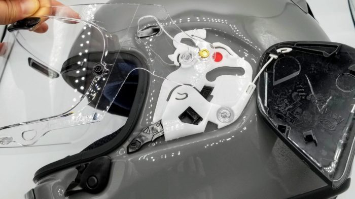 Exchanging visor. View of visor mechanism. Exchanging visor. View of visor mechanism.