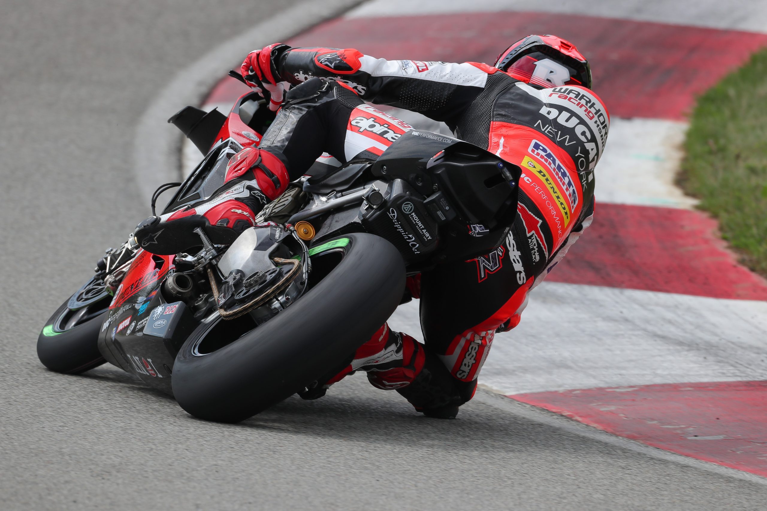 a back view of Loris Baz astride his Warhorse HSBK Racing Ducati New York entry, ready to complete in the opening round of MotoAmerica, at the Pittsburgh International Raceway