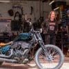 Indian Larry and Paul Cox next to the custom motorcycle built by Indian Larry, Paul Cox, and Keino Sasaki