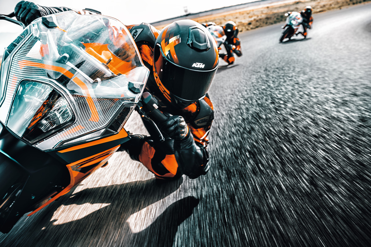 A view of racers trying out the all-new 2022 KTM RC390 on the track