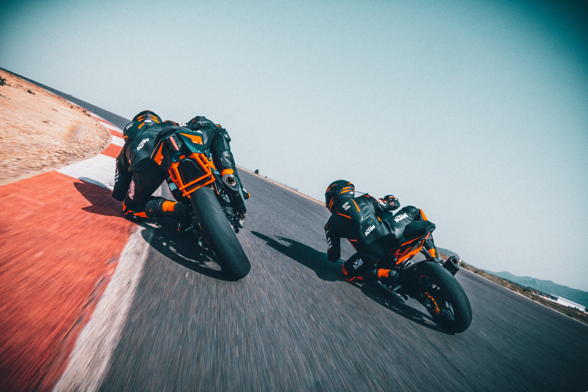 A view of racers trying out the all-new 2022 KTM RC390 on the track