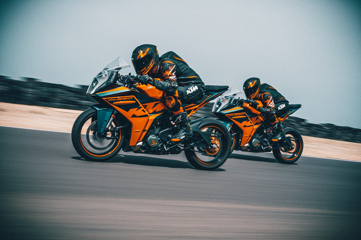 A view of racers trying out the all-new 2022 KTM RC390 on the track