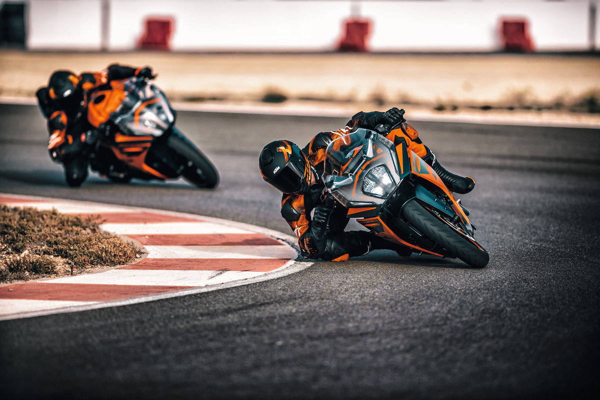 A view of racers trying out the all-new 2022 KTM RC390 on the track